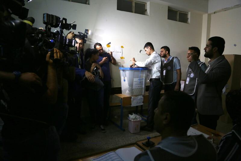 Election officials close a polling station to start the counting during the Kurdistan parliamentary election in Erbil, the capital of the Kurdistan Region in Iraq. EPA