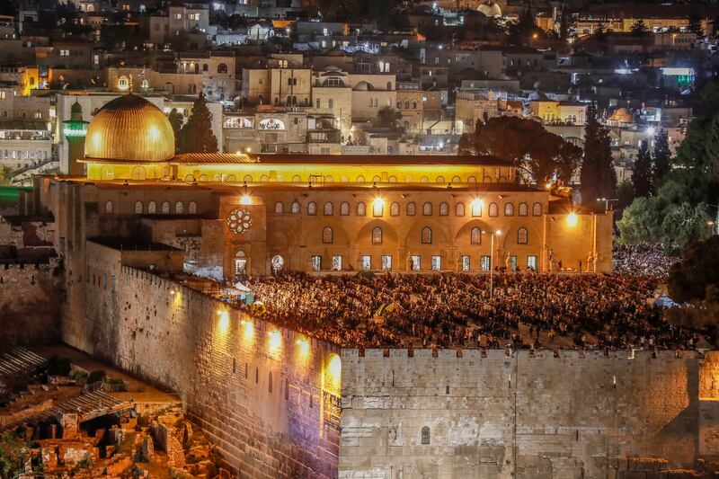 Palestinians attend prayers on the 27th day of Ramadan. EPA