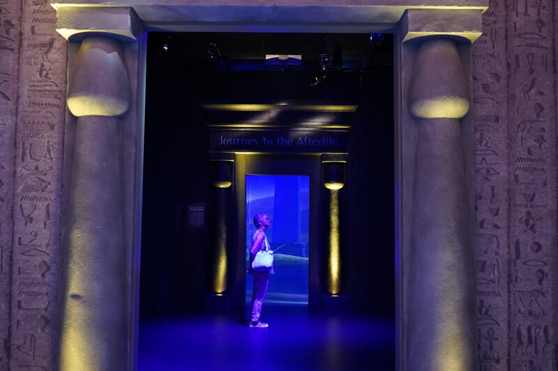 Visitors move from life into death and afterlife, in National Geographic's Beyond King Tut experience. Photo: Katarina Holtzapple / The National  