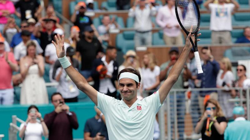 Roger Federer seen here winning last year's Miami Open, beating John Isner 6-1, 6-4 in the final. AP Photo