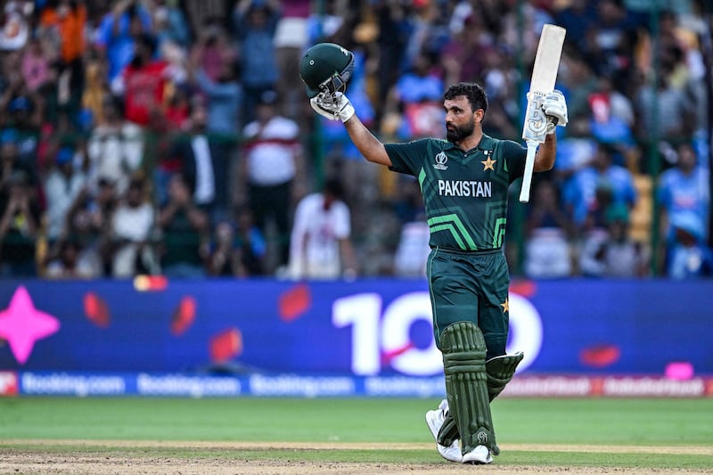 Pakistan's Fakhar Zaman celebrates after reaching his century in the World Cup clash against New Zealand in Bangalore on November 4, 2023. Pakistand won the game by 21 runs via the DLS Method. AFP