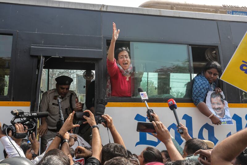 Delhi's Education Minister Atishi Marlena is detained during the protests. EPA