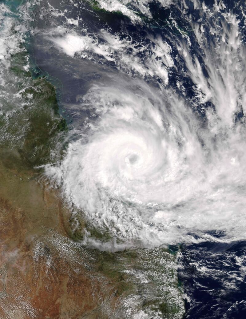 Image released by NASA shows a natural colour image of Cyclone Debbie approaching the coast of Queensland that was captured by the MODIS – or Moderate Resolution Imaging Spectroradiometer - on NASA’s Aqua satellite. Jeff Schmaltz  / NASA  / AFP Photo