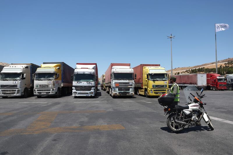 A convoy of lorries carrying humanitarian aid near the Syrian Bab Al Hawa border crossing with Turkey. AFP