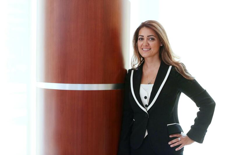 Sedef Gunsur, an executive director at National Bank of Abu Dhabi, says that her aversion to risk has sometimes led her to miss out on financial opportunities. Christopher Pike / The National