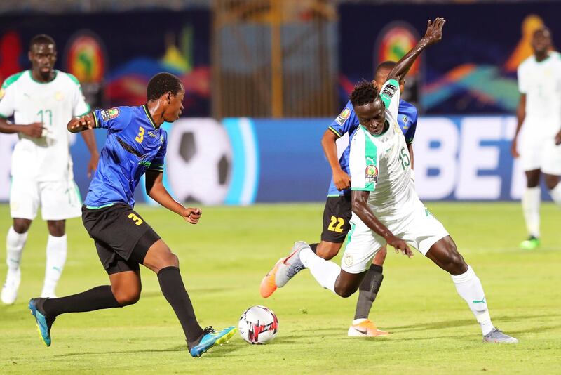 Senegal's Krepin Diatta, right, in action against Tanzania's Feisal Patrick. EPA