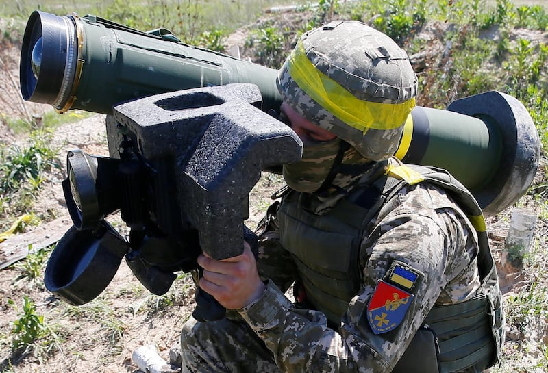 A soldier holds a Javelin missile system during a military exercise in the training centre of Ukrainian Ground Forces near Rivne, Ukraine May 26, 2021. Picture taken May 26, 2021. REUTERS/Gleb Garanich