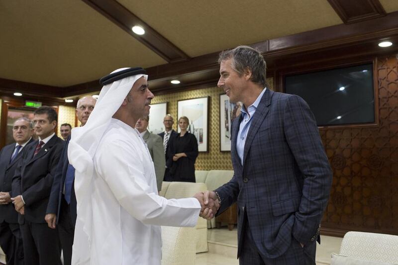 Lt General Sheikh Saif bin Zayed Al Nahyan, Deputy Prime Minister and Minister of Interior, greets Dan Buettner at Al Bateen Palace. Ryan Carter / Crown Prince Court 