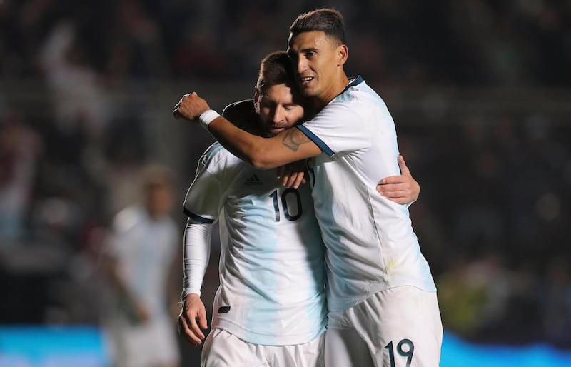 Argentina's Lionel Messi, left, in action against Nicaragua in San Juan, Argentina, on Friday. Nicolas Aguilera / AP Photo