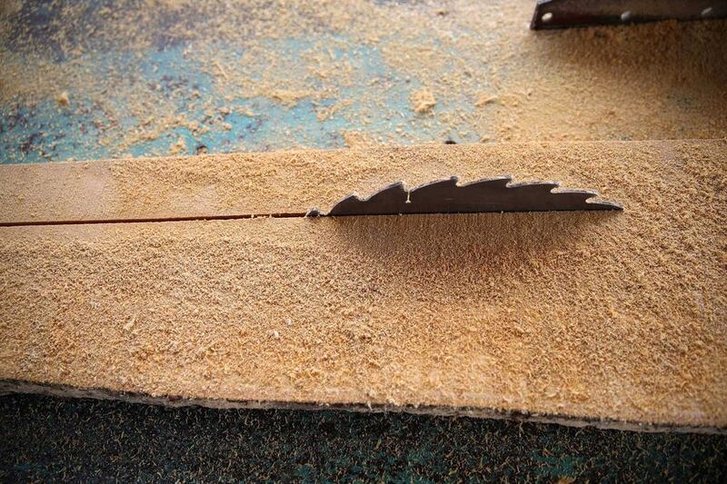 A saw blade cuts through a plank at a sawmill near an unreserved forest in Igede-Ekiti township. Akintunde Akinleye / Reuters