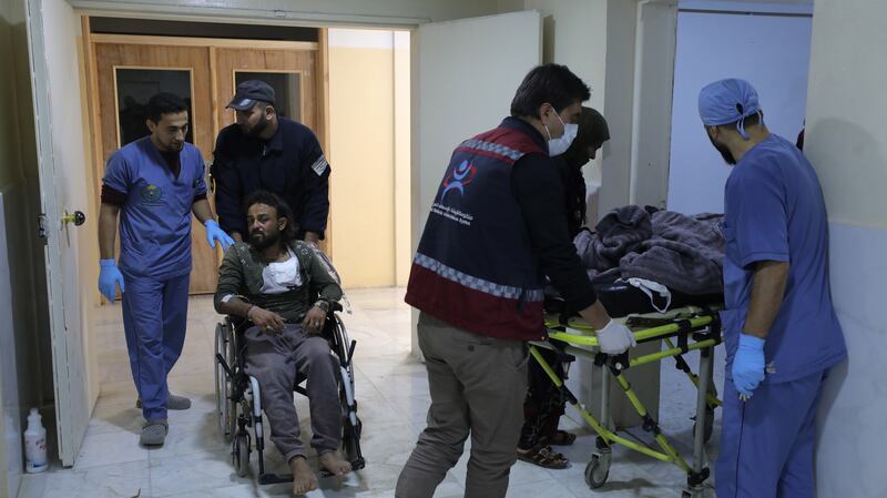 People injured in the shelling of Maram camp for internally displaced people are brought to hospital. EPA