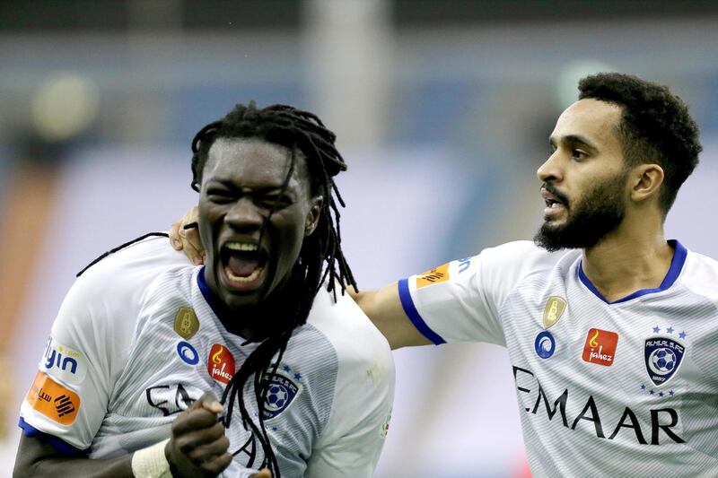 Al-Hilal's French player Bafetimbi Gomis (L) celebrates after scoring a goal during the Saudi Professional League soccer match between Al-Nassr and Al-Hilal, Riyadh, Saudi Arabia. EPA