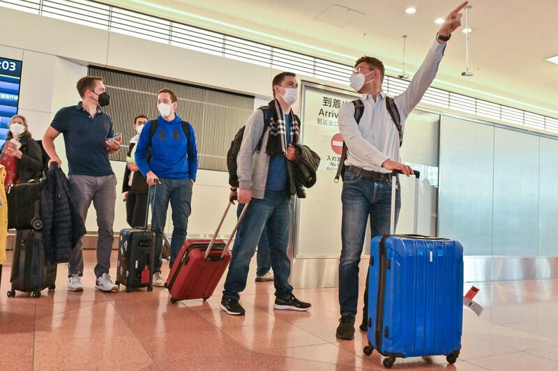 International passengers arrive at Tokyo's Haneda Airport after two-and-a-half years of Covid-19 restrictions in Japan. AFP