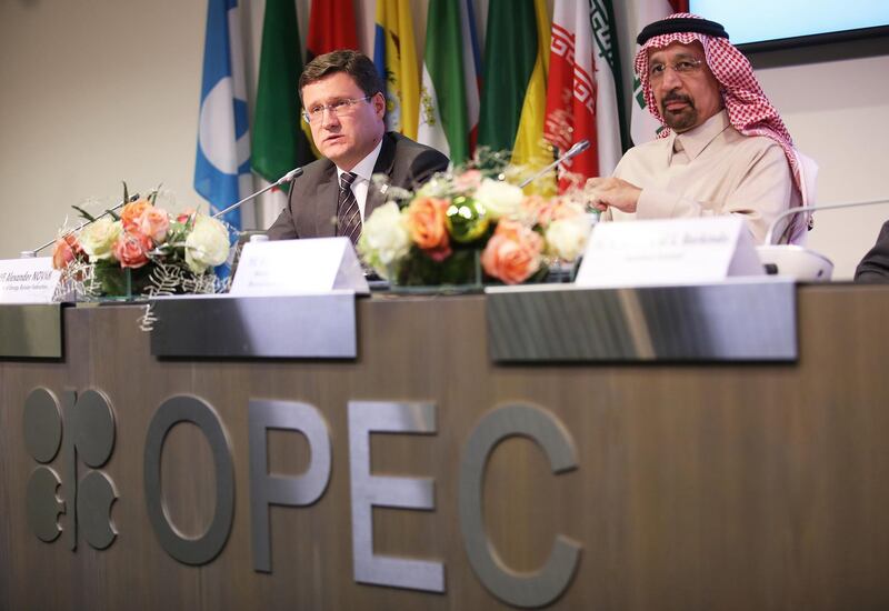 Alexander Novak, Russia's energy minister, left, speaks as Khalid Al-Falih, Saudi Arabia's energy and industry minister, listens during a news conference following the 173rd Organization of Petroleum Exporting Countries (OPEC) meeting in Vienna, Austria, on Thursday, Nov. 30, 2017. OPEC agreed to extend its oil-production cuts to the end of 2018 and included Libya and Nigeria in the deal for the first time, according to delegates gathered in Vienna. Photographer: Akos Stiller/Bloomberg