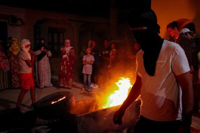 Angry residents in Zarzis, southern Tunisia, after migrants from there who died when their boat sank were buried without their families being told. Photo: Ghaya Ben Mbarek for The National