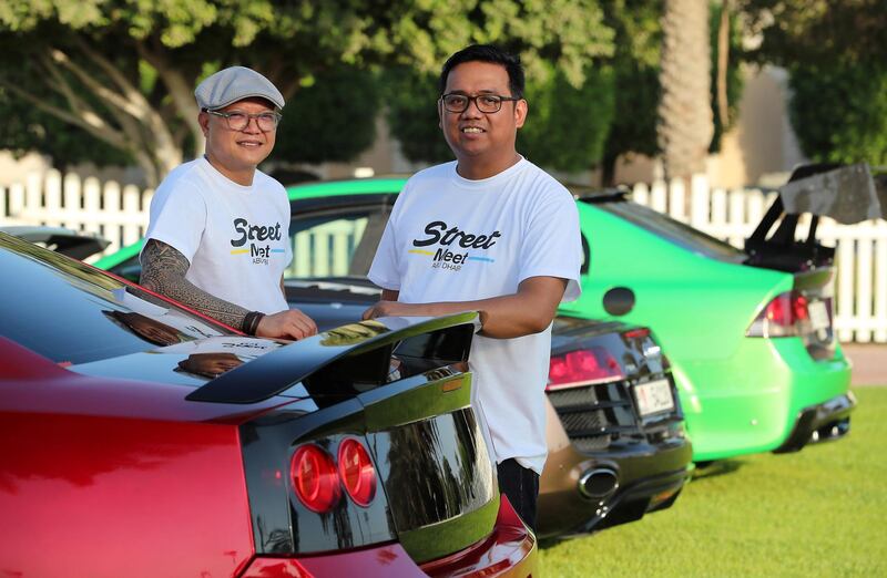 ABU DHABI , UNITED ARAB EMIRATES ,  October 14 , 2018 :- Left to Right ��� Glenn Navarro and Zingiber Umali , organizers with the Modified cars for the StreeMeet car show which will be taking place on 26th October at the Abu Dhabi City Golf Club in Abu Dhabi. ( Pawan Singh / The National )  For Weekend. Story by Adam Workman