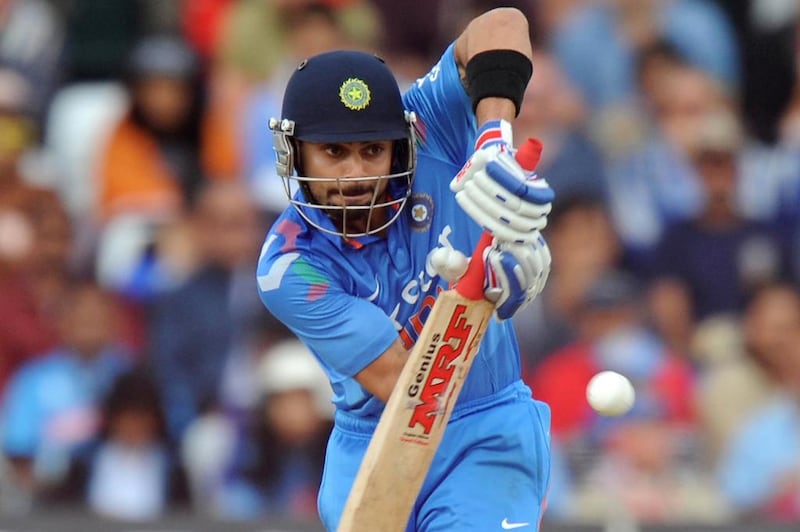Virat Kohli plays a shot during an ODI against England in August. Olly Greenwood / AFP / August 30, 2014