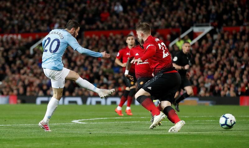 Bernardo Silva scores Manchester City's first goal against Mancheter United at Old Trafford on Wednesday. Carl Recine / Reuters