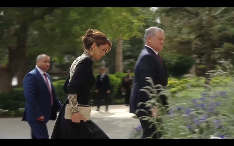 The couple walking in ahead of the ceremony 