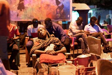 epa07606647 A Sudanese tea vendor falls a sleep after Ramadan dinner rush hour at the sit-in against military rule, near the Army Headquarters, in Khartoum, Sudan, 23 May 2019 (issued 27 May 2019). The women in Sudan have realized that a new era has begun, and they finally have the opportunity to reclaim space and recognition so often postponed by tradition, religion and machismo. At the sit-in against military rule taking place since more than one moth ago outside the Army Headquarters, Sudanese women, from all walks of life and various ages, are visible: debating, performing, participating in the logistics running the huge revolutionary space and making sure their voices are heard in every corner of the gathering and beyond. EPA/AMEL PAIN ATTENTION: This Image is part of a PHOTO SET