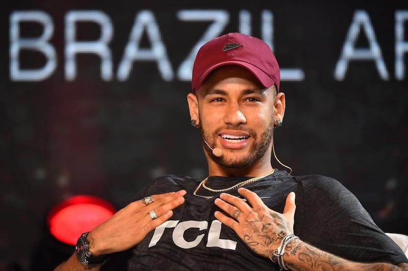 TOPSHOT - Brazilian PSG's footballer Neymar Junior takes part in a promotional event of the Chinese consumer electronic brand TCL for the media, in Sao Paulo, Brazil, on April 17, 2018.
Brazilian superstar Neymar said Tuesday that he won't be back playing at least until the second half of May, when he is scheduled to have his final medical exam following foot surgery. / AFP PHOTO / Nelson ALMEIDA