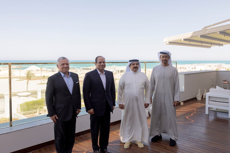 Sheikh Mohamed poses with King Hamad, Mr El Sisi and King Abdullah, with New Alamein's coast in the background. Ryan Carter / UAE Presidential Court
