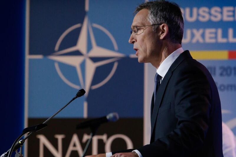 NATO Secretary General Jens Stoltenberg addresses a press conference on the second day of the North Atlantic Treaty Organization (NATO) summit in Brussels on July 12, 2018.  / AFP / Aris Oikonomou
