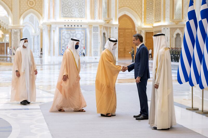 Sheikh Mansour bin Zayed Al Nahyan, UAE Deputy Prime Minister and Minister of Presidential Affairs (3rd R) greets Mr Mitsotakis during the official reception at Qasr Al Watan.