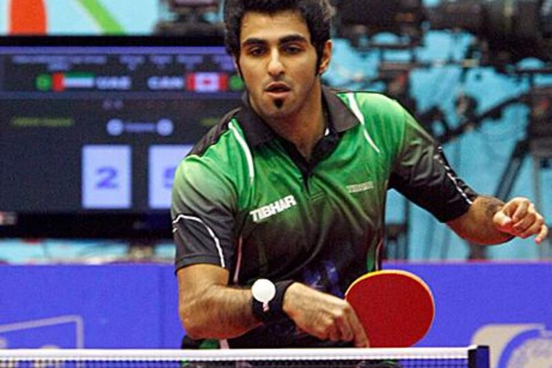 Rashid Omar, the UAE’s No 1 player, put on a brave display to beat Canada’s Pierre-Luc Hinse at Al Nasr Sports Club last night.  Jeffrey E Biteng  / The National