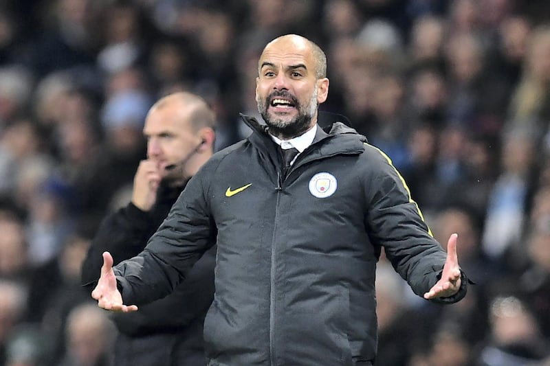 Manchester City's Spanish manager Pep Guardiola gestures on the touchline during the English Premier League football match between Manchester City and Arsenal at the Etihad Stadium in Manchester, north west England, on December 18, 2016. - Manchester City won the game 2-1. (Photo by Paul ELLIS / AFP) / RESTRICTED TO EDITORIAL USE. No use with unauthorized audio, video, data, fixture lists, club/league logos or 'live' services. Online in-match use limited to 75 images, no video emulation. No use in betting, games or single club/league/player publications. / 