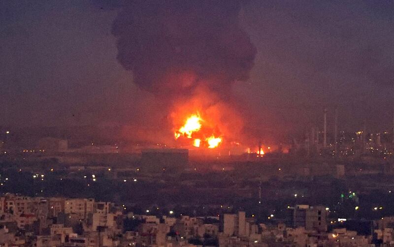 Smoke billows from the site of a refinery fire in the Iranian capital Tehran. AFP