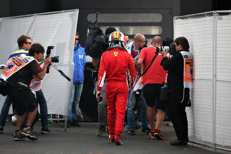 HOCKENHEIM, GERMANY - JULY 22: Sebastian Vettel of Germany and Ferrari walks back into the paddock after crashing during the Formula One Grand Prix of Germany at Hockenheimring on July 22, 2018 in Hockenheim, Germany.  (Photo by Charles Coates/Getty Images)
