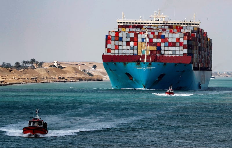 A shipping container passes through the Suez Canal in Egypt. Reuters
