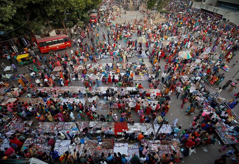 Shoppers crowd at a market place ahead of the Hindu festival of Diwali in Ahmedabad, India, November 2, 2018. REUTERS/Amit Dave