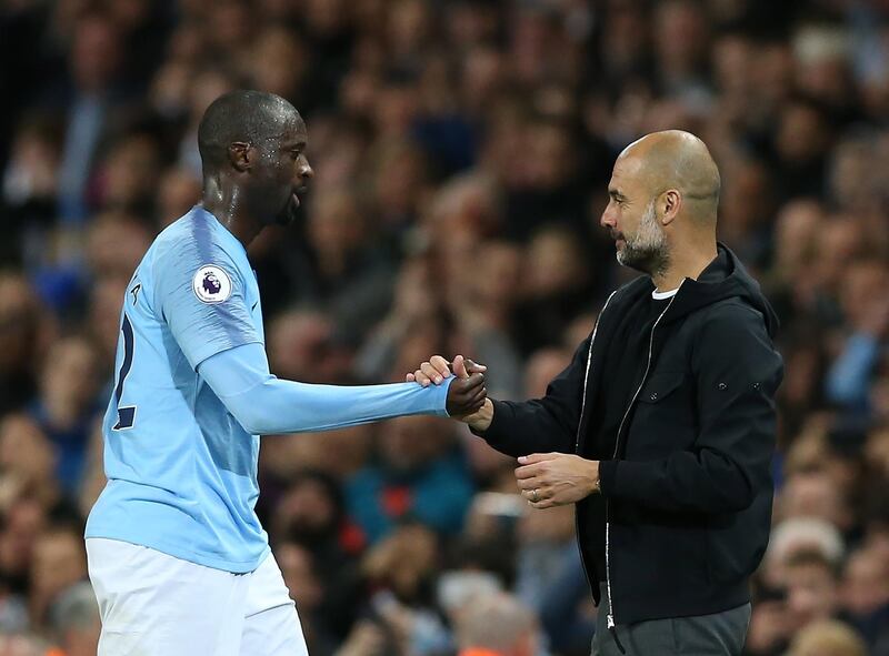 epa06723880 Manchester City's Yaya Toure (L) shakes hands with manager Pep Guardiola after being substituted on his final appearance for Manchester City during the English Premier League soccer match between Manchester City and Brighton at the Etihad Stadium in Manchester, Britain, 09 May 2018.  EPA/NIGEL RODDIS EDITORIAL USE ONLY. No use with unauthorised audio, video, data, fixture lists, club/league logos 'live' services. Online in-match use limited to 75 images, no video emulation. No use in betting, games or single club/league/player publications.