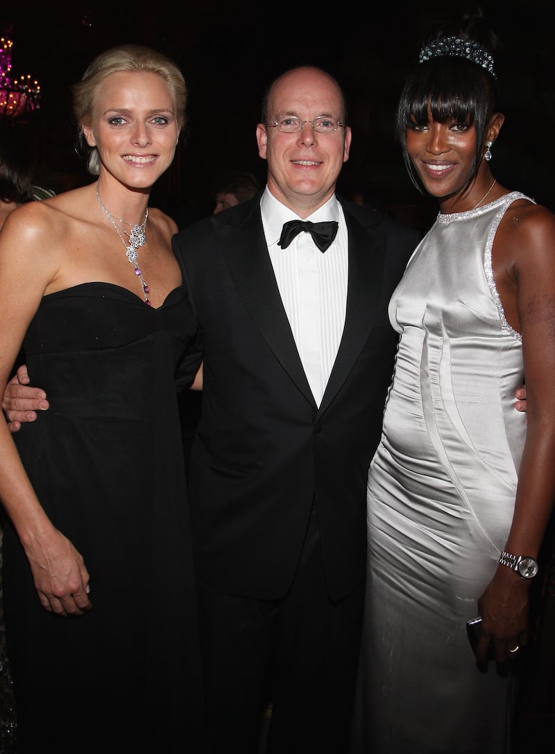 Charlene Wittstock, in a black strapless dress, with Prince Albert II of Monaco and Naomi Campbell, attends the Unite For A Better World Gala Dinner, in Monte Carlo on September 2, 2007. Getty Images