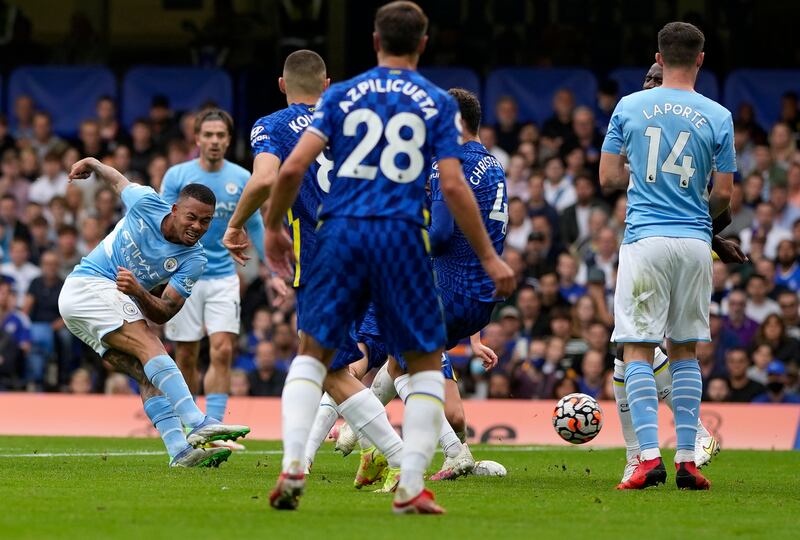 Manchester City's Gabriel Jesus, left, scores the only goal of the game against Chelsea at Stamford Bridge on Saturday, September 25, 2021. AP