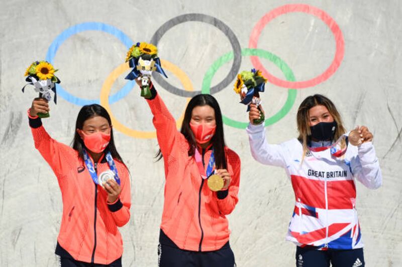 From left: Silver medalist Kokona Hiraki from Japan, gold medal winner Sakura Yosozumi from Japan and Great Britain's Sky Brown with her bronze medal.