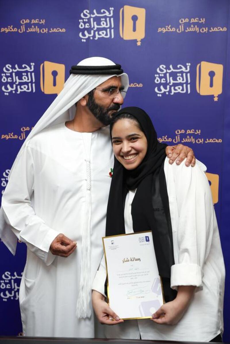 Sheikh Mohammed bin Rashid congratulates Fatma Al Nuaimi for her part in the Arab Reading Challenge. Wam