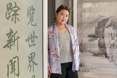 Wang Lu Lin is learning English in Dubai and has signed up for the Sinopharm vaccine that is being offered to Chinese on visit visas to the UAE at the International City in Dubai on May 26,2021. Pawan Singh / The National. Story by Ramola