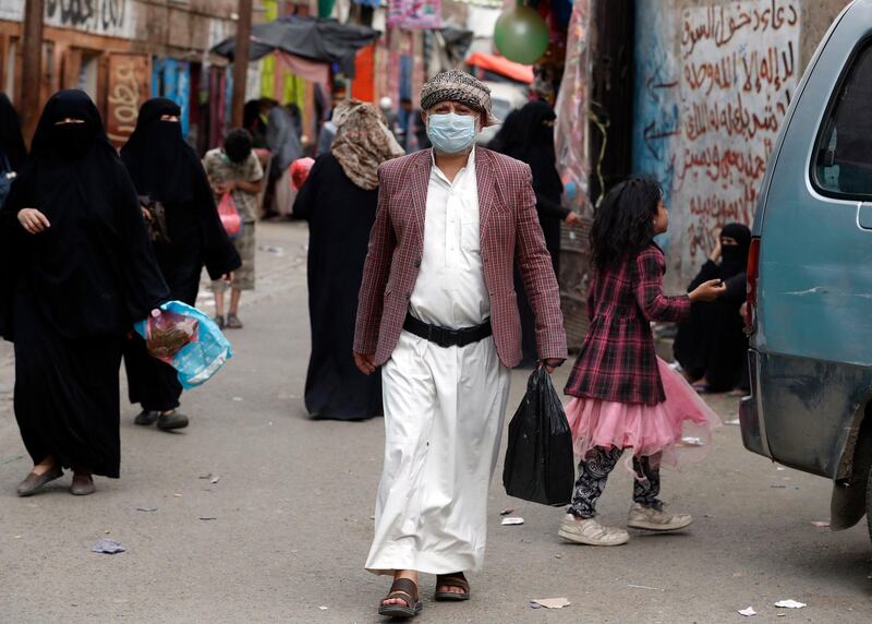 epa08428689 A Yemeni wears a protective face mask amid the ongoing coronavirus COVID-19 pandemic in Sanaa, Yemen, 15 May 2020 (Issued 17 May 2020). Countries around the world are taking increased measures to stem the widespread of the SARS-CoV-2 coronavirus which causes the COVID-19 disease.  EPA/YAHYA ARHAB