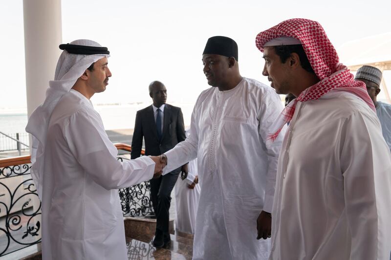 ABU DHABI, UNITED ARAB EMIRATES - July 15, 2019: HH Sheikh Abdullah bin Zayed Al Nahyan UAE Minister of Foreign Affairs and International Cooperation (L), receives with Adama Barrow, President of Gambia (2nd L), during a Sea Palace barza. Seen with HH Sheikh Mansour bin Zayed Al Nahyan, UAE Deputy Prime Minister and Minister of Presidential Affairs (R).

( Mohamed Al Hammadi / Ministry of Presidential Affairs )
---