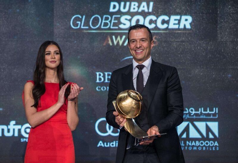 Jorge Mendes shown being awarded 'Best Agent' on Sunday at the Globe Soccer Awards in Dubai. AFP Photo
