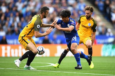 LEICESTER, ENGLAND - AUGUST 19: Shinji Okazaki of Leicester City attempts to get past Shane Duffy of Brighton and Hove Albion during the Premier League match between Leicester City and Brighton and Hove Albion at The King Power Stadium on August 19, 2017 in Leicester, England.  (Photo by Michael Regan/Getty Images)