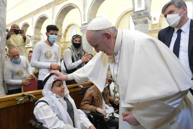 Pope Francis visits the Syriac Catholic Church of the Immaculate Conception in the predominantly Christian town of Qaraqosh, in Nineveh province, some 30 kilometres from Iraq's northern Mosul in Iraq, on Sunday March 7, 2021. EPA