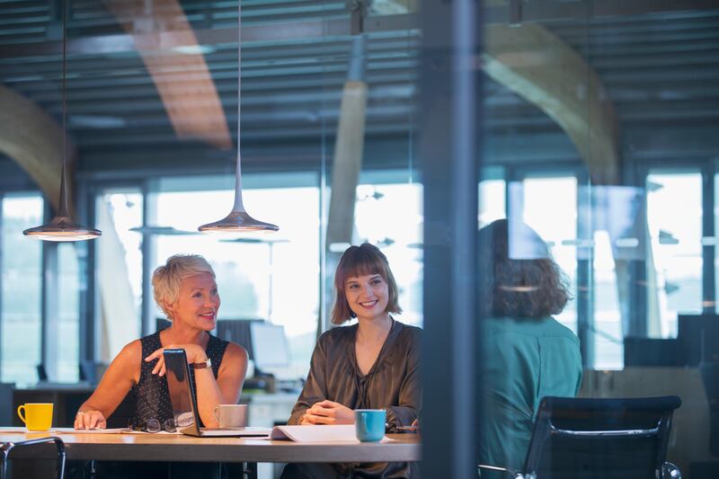 Businesswomen talking in office meeting (Getty Images) *** Local Caption ***  bz12ja-wellbeing-women.jpg