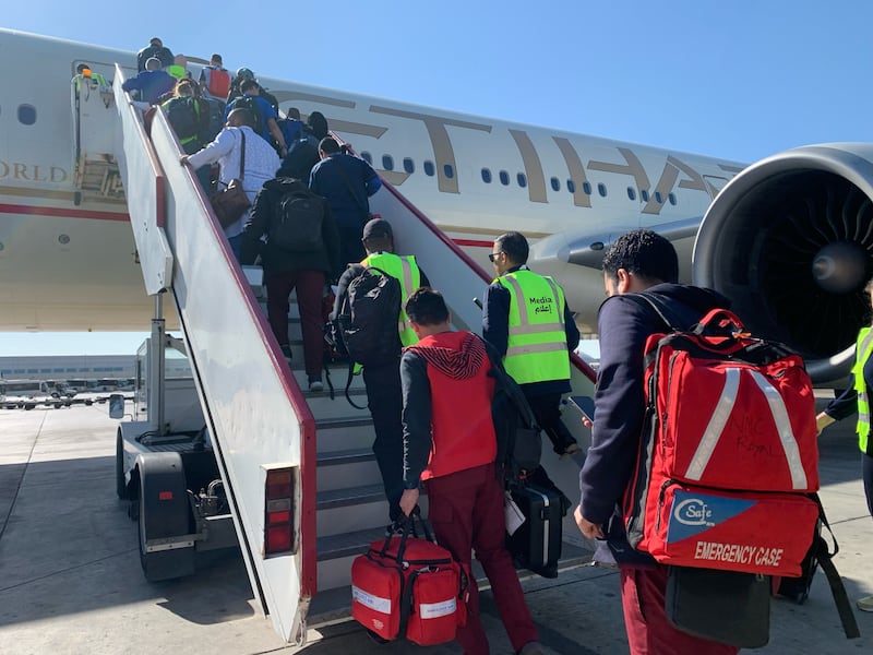 Medical staff boarding a UAE plane headed for Al Arish, Egypt, from Abu Dhabi International Airport. All photos: Pawan Singh / The National