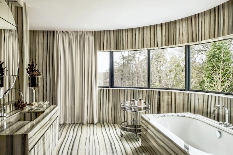 The master bathroom is finished in vein cut calacatta zebra marble tiling. Courtesy Savills