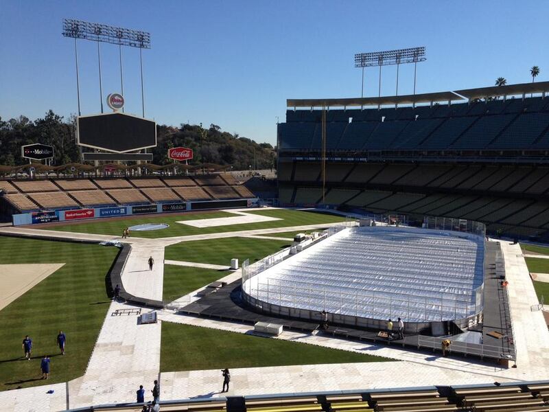 The hockey rink in Dodger Stadium? That's what's being built as Los Angeles prepares to host one of the NHL's outdoor games on January 25, one of the league's efforts to reinvent itself. Beth Harris / AP Photo