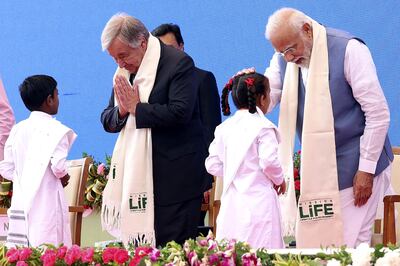 Children greet Narendra Modi and Antonio Guterres at an event at the Statue of Unity in Kevadia in Gujarat state. AFP